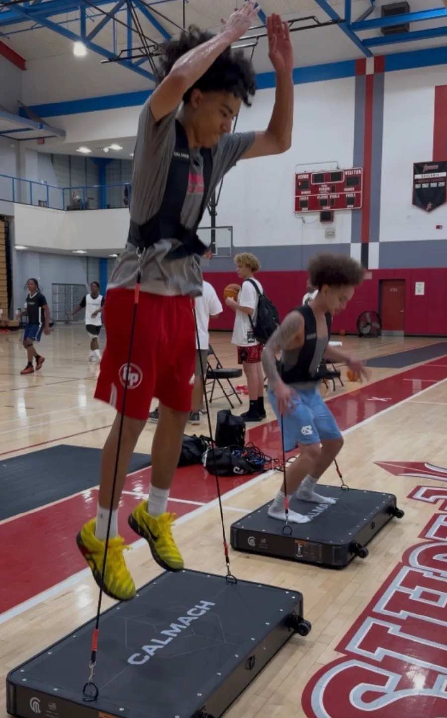 Athletes jumping on Calmach platforms during a gym session